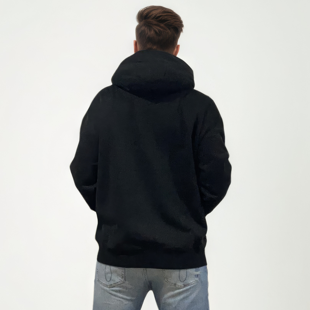 Person wearing a black hoodie from behind on a white background