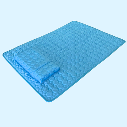Blue textured cooling mat on a light blue background